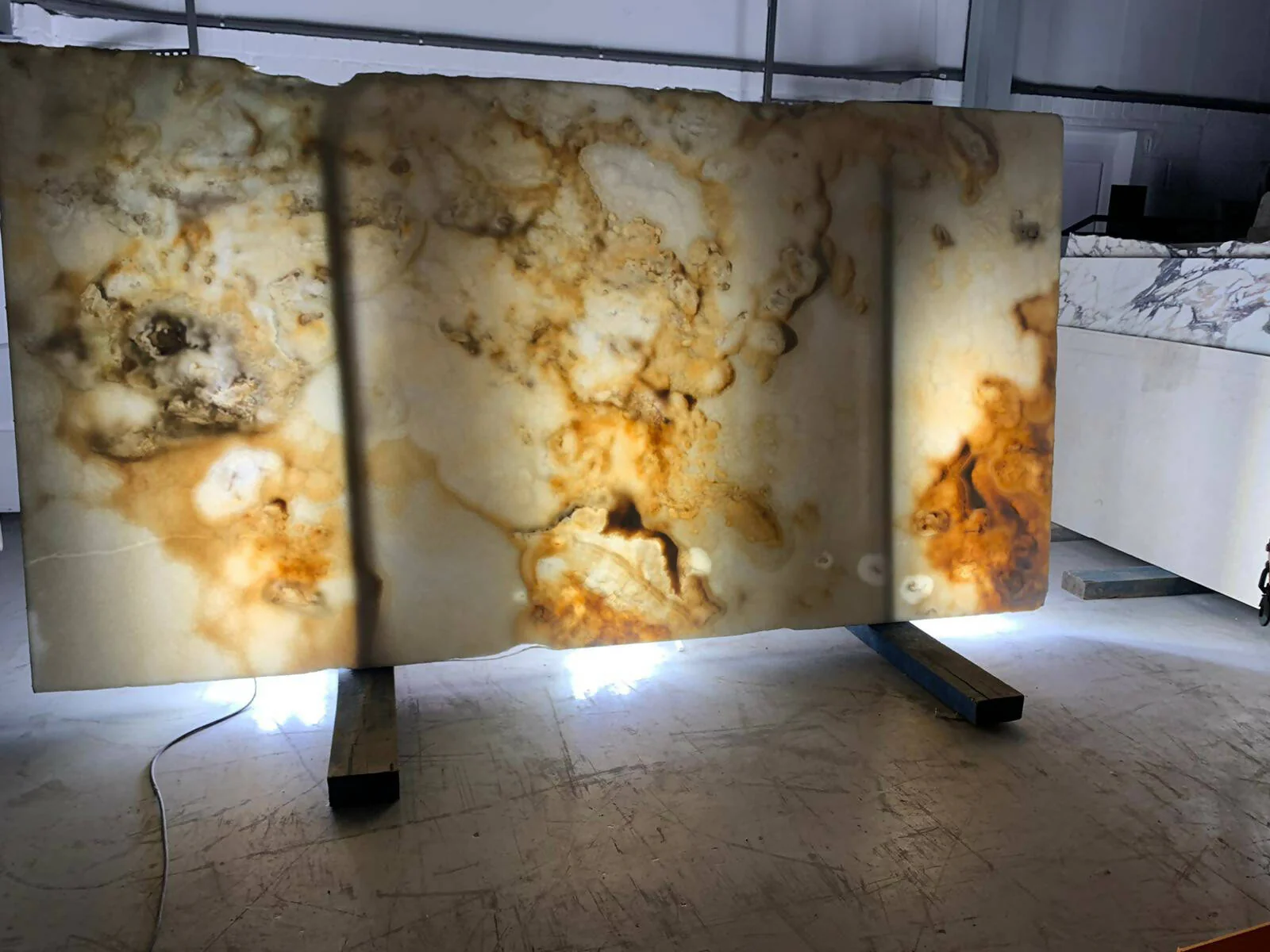 WHITE BOOKMATCH ONYX CROSS-CUT